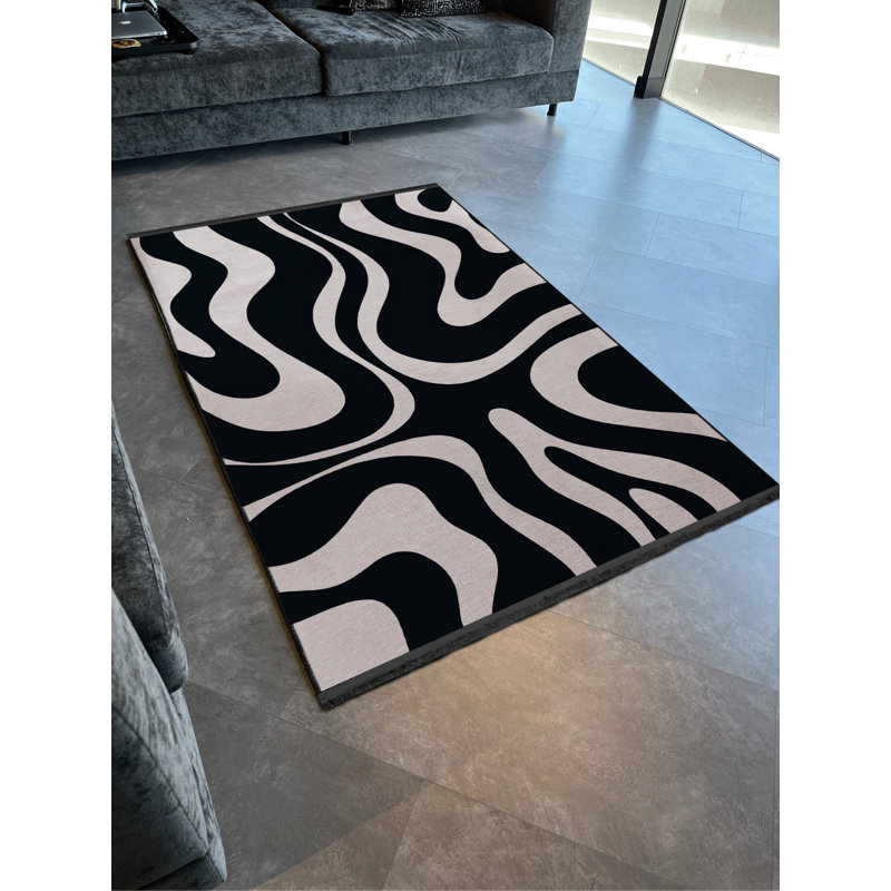Tapis décoratif à motif zébré noir et beige