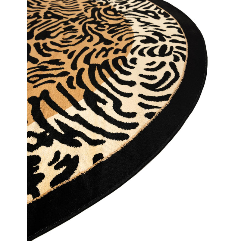Round 7'10" Light Brown and Black Animal Print Synthetic Rug