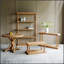 Table basse rectangulaire rustique avec rangement à 2 niveaux, en bois naturel, pieds balustres sculptés, idéale pour une décoration de style champêtre ou maison de campagne française.