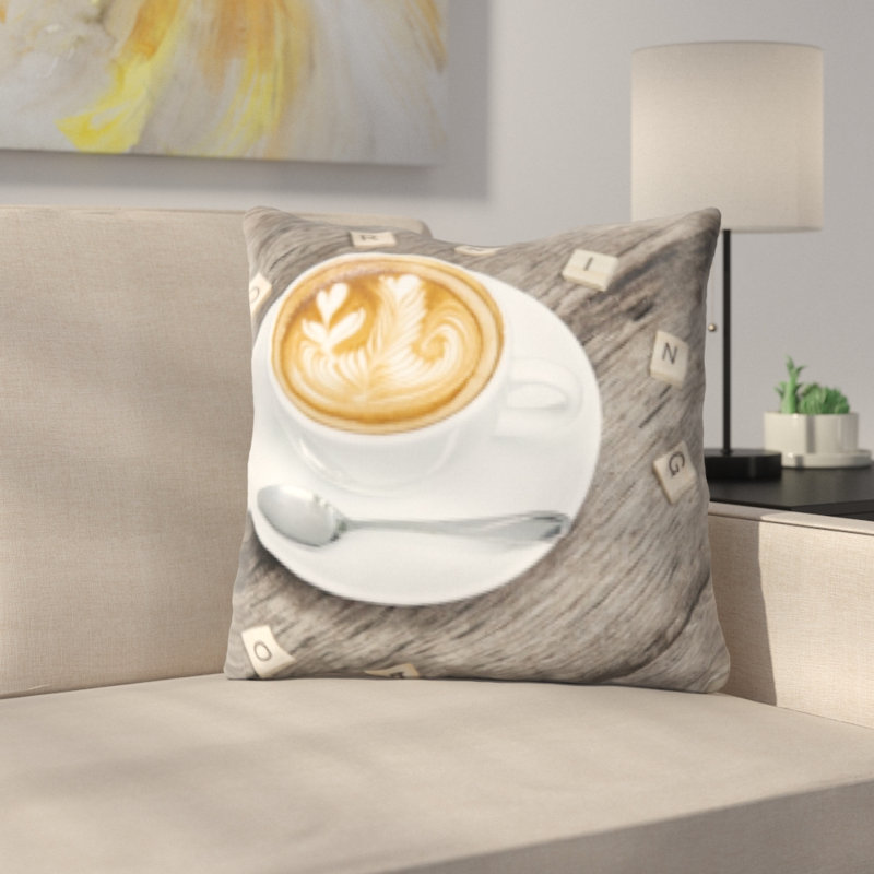 Coussin décoratif bensley café sur table