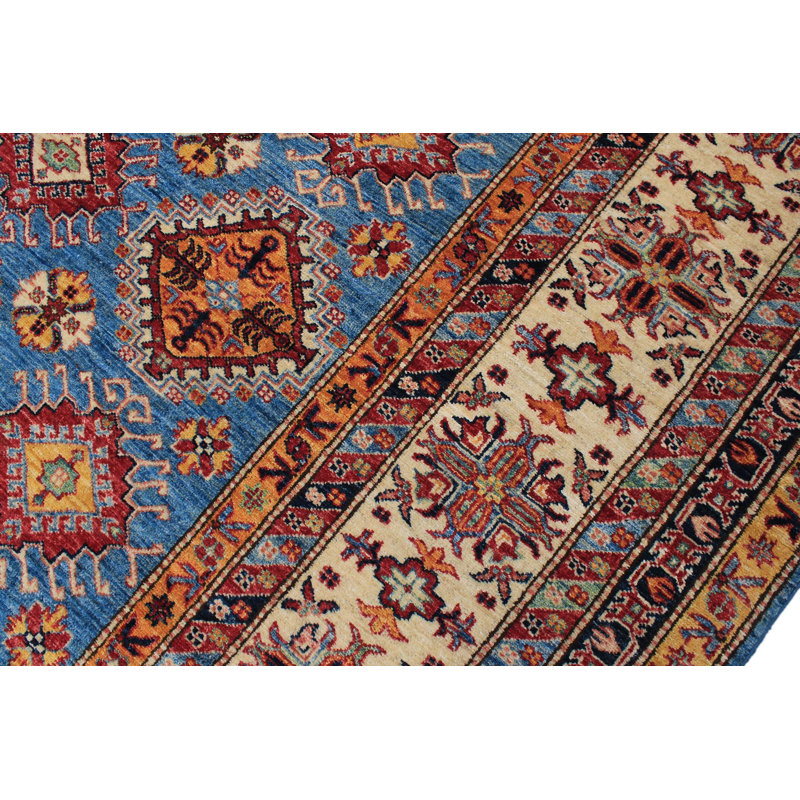 Tapis oriental bleu en laine noué à la main 9 pi x 12 pi 1 po Madeeha
