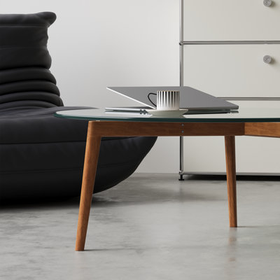 Table basse avec plateau en verre et structure en bois massif
