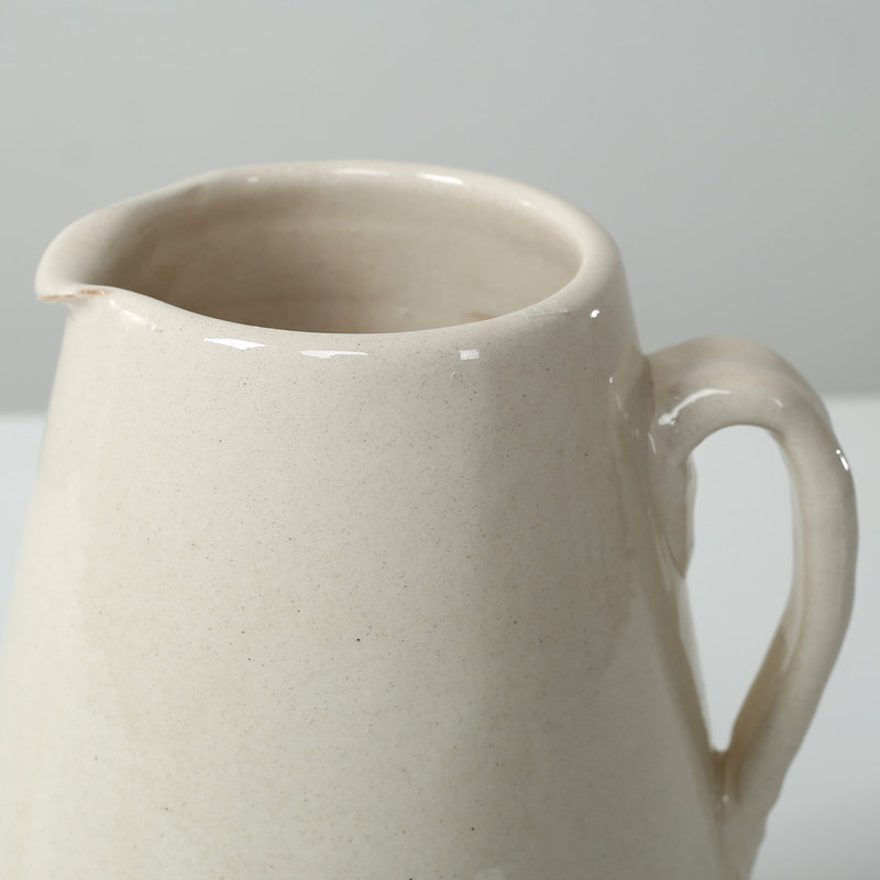 Approx. 9" High Off Whtie Ceramic Pitcher