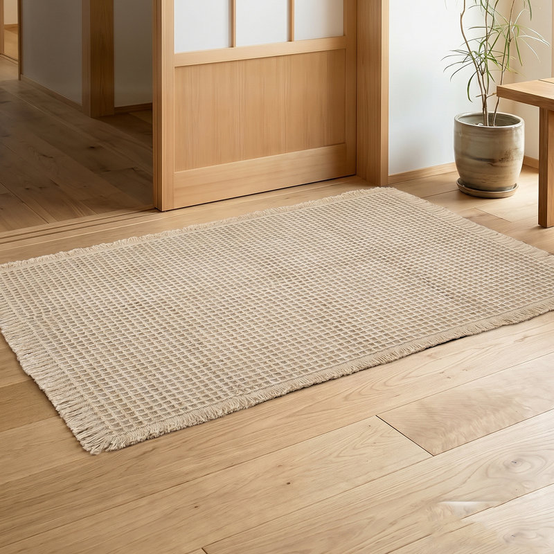 Tapis d'entrée en polyester 60 x 90 cm Waffle Weave Tassel