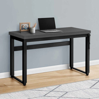 Bureau d'ordinateur réglable pour le bureau à domicile, conception moderne avec stratifié gris et structure en métal noir, idéal pour les petits espaces