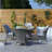 Anikha 4 - Person Wicker Patio Dining Set with Round Table , Cushions Included-1004006868-1004003092