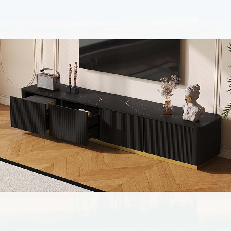 Meuble télé de luxe cannelé pour téléviseur de 85 à 85 po, console multimédia de table en faux marbre avec 4 tiroirs, conception à profil incurvé, centre de divertissement moderne avec base dorée, noir