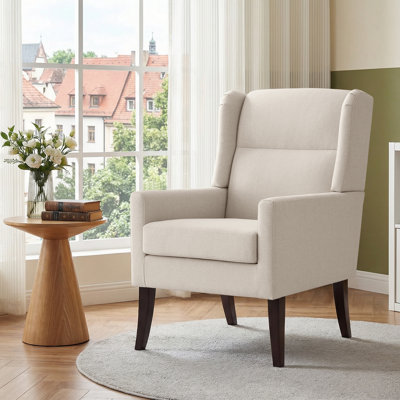 Fauteuil d'appoint rembourré en polyester à haut dossier avec ressorts à arc