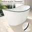 Baignoire autoportante moderne en acrylique 63 po x 31 po, baignoire à garniture noire avec dossier double incliné, capacité de 56 gallons et ensemble de bonde