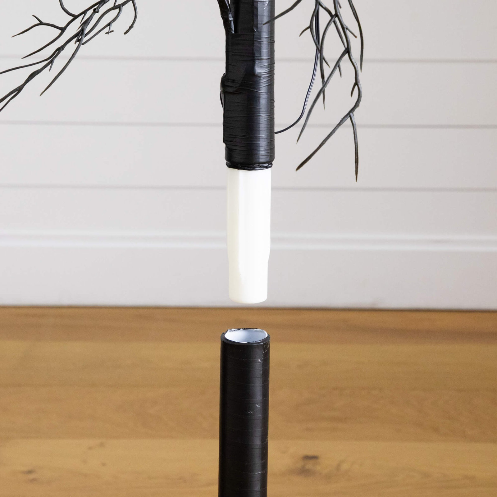 Pre-Lit Artificial Halloween Black Twig Tree With 18 Orange LED Pumpkin Shaped Lights, 48" H x 20" W x 20" D