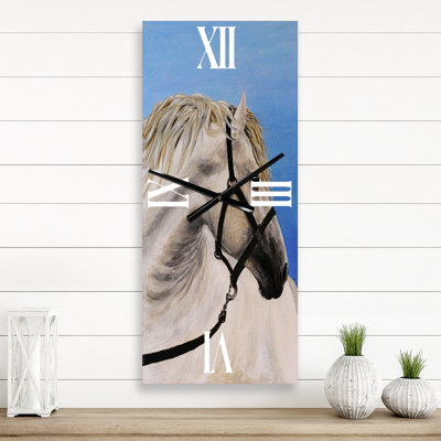 Horloge murale Portrait d'un cheval blanc dans le sillon