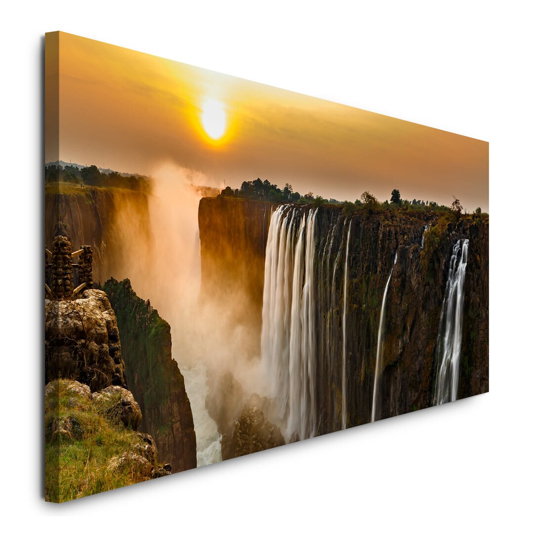 Leinwandbild Wasserfall mit Sonnenuntergang