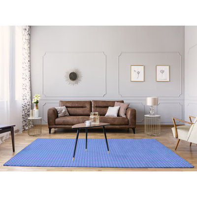 Tapis bleu à rayures losanges