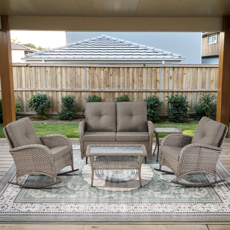 This Handcrafted 5-Piece Outdoor Seating Group Infuse Your Porch Or Patio With Timeless Charm And Natural Elegance. The Set Includes A Glider Loveseat,  2 Classic Rocking Armchairs, A Side Table And A Coffee Table, Hand Woven PE Wicker Paired With A Curv