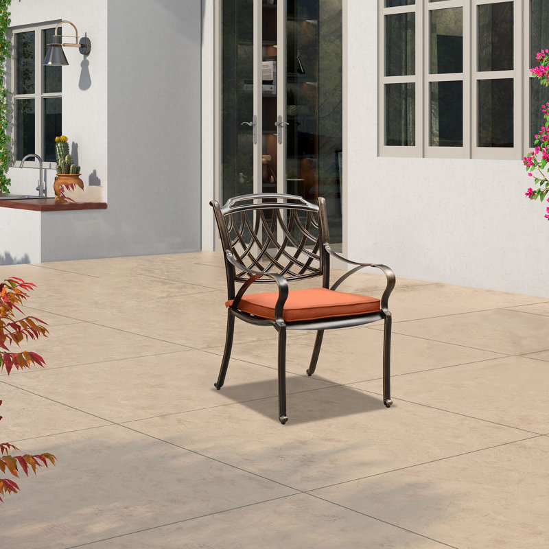 Chaise de salle à manger d'extérieur en métal avec coussin Arelli, Rouge brique