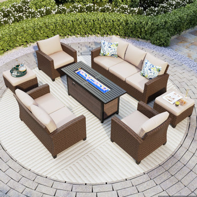 Argyri 9 - Person Outdoor Wicker Patio Conversation Furniture Set with Fire Pit Table