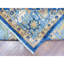 Tapis oriental bleu en laine noué à la main 8 pi 7 po x 11 pi 11 po Aryana