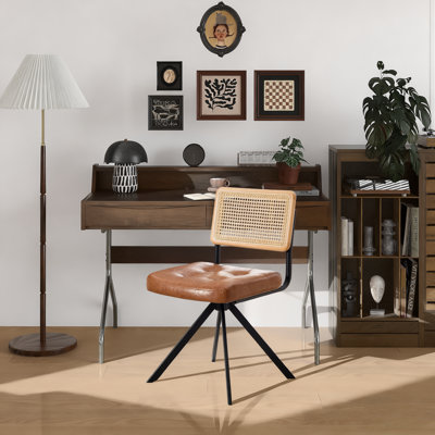 Markwart Mid-Century Modern Swivel Task Chair with Rattan Low Back Tufted Seat and Black Steel Frame