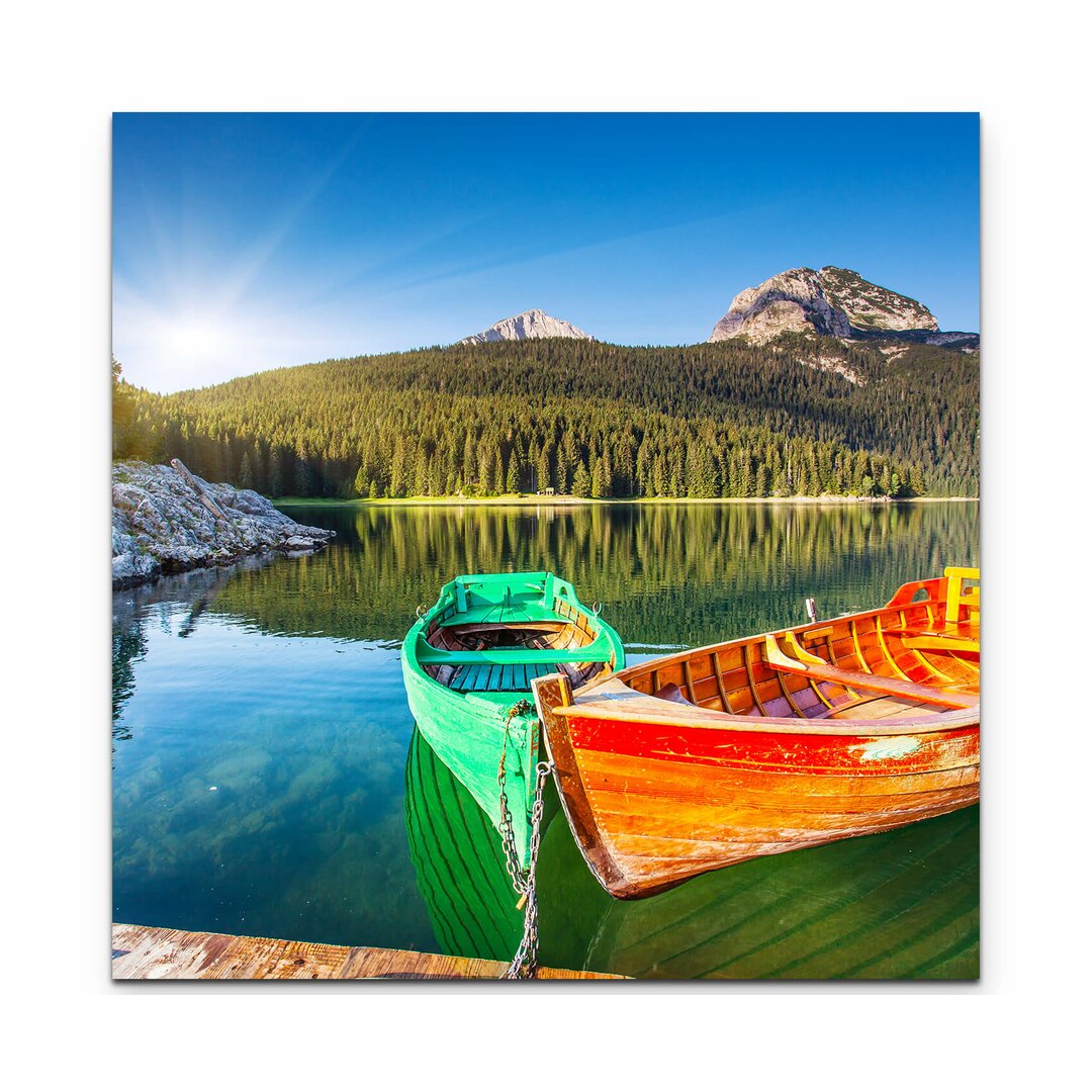 Leinwandbild Bergsee mit Spiegelung und Booten