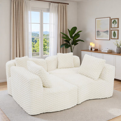 Canapé modulaire modulaire avec silhouette arrondie et coussins