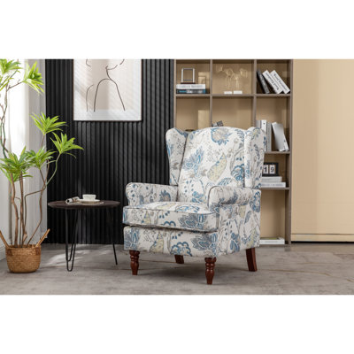 Fauteuil rembourré floral bleu avec structure en pin et courbé pour le confort de la chambre à coucher
