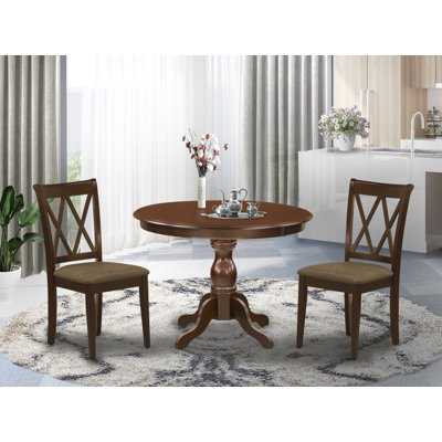 L'ensemble de salle à manger 3 pièces comprend une table de salle à manger ronde avec piédestal et 2 chaises en tissu de lin, acajou