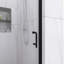Porte de douche pivotante l 36 po x H 72 po à finition demi-cadre noir mat
