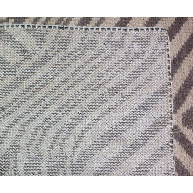 Tapis gris / blanc en laine tissé à la main
