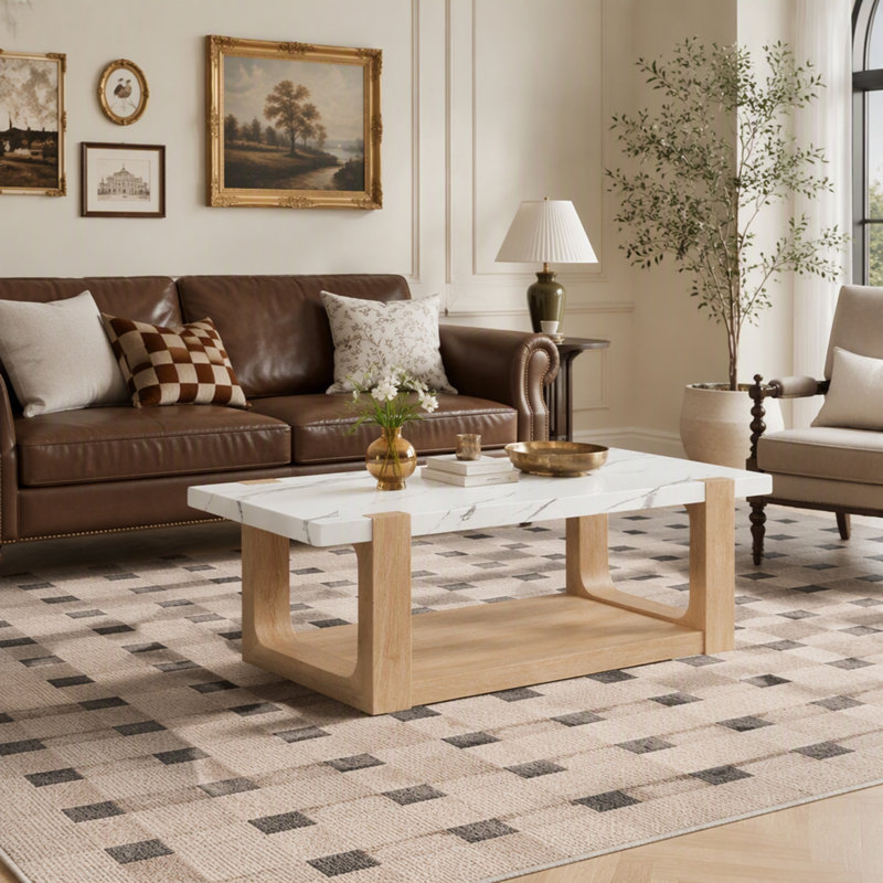 Table basse contemporaine moderne avec plateau en faux marbre et design bicolore, idéale pour rehausser l'esthétique de n'importe quel salon.