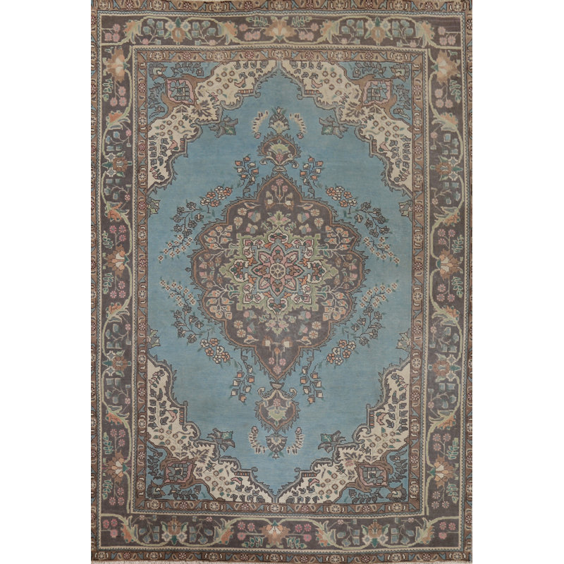 Tapis bleu clair fait à la main 7 x 9