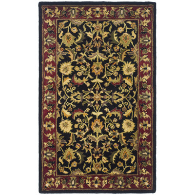 Tapis oriental en laine noir, rouge, vert et or fabriqué et touffeté à la main Cranmore