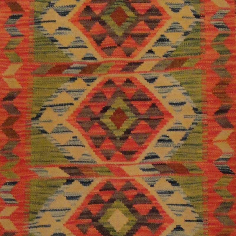 Tapis rouge / brun / vert en laine Kilim