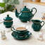Service à thé en porcelaine 22 pièces pour 6 avec théière, tasses, soucoupes et pièces de service - motif floral en relief élégant