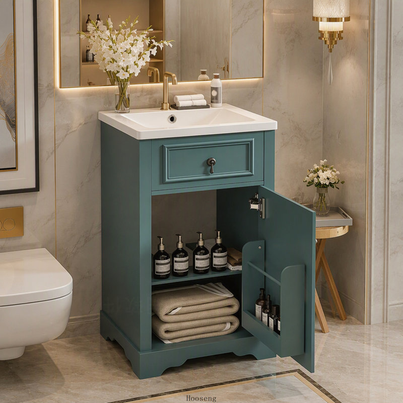 Meuble-lavabo de 50 cm avec lavabo en céramique, porte à fermeture amortie, tablette réglable et tablette de rangement intégrée à la porte.