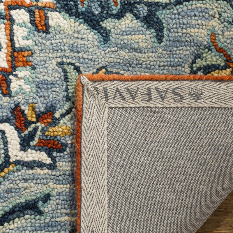 Blue and Rust Round Tufted Wool Floral Rug