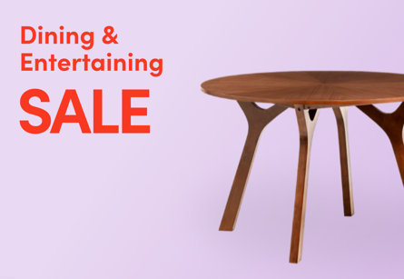Dining & Entertaining Sale promotional banner featuring a round wooden dining table on a lavender background
