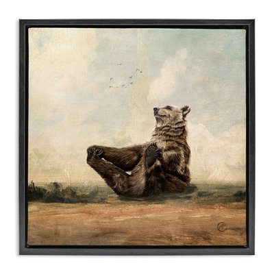 Bear Holding Paws Watching Sunset