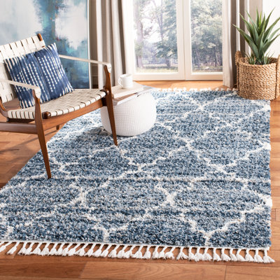 Tapis géométrique bleu clair Ch Wilson