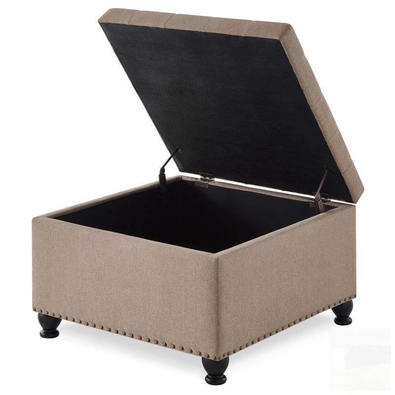 Grand repose-pieds de rangement carré avec pieds en bois, table basse capitonnée avec garniture cloutée pour l'espace de vie