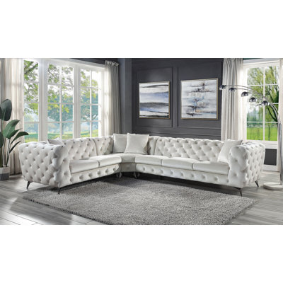 Canapé modulaire en tissu beige avec 4 coussins Atronia