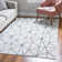 Tapis géométrique ivoire / gris Nuangola