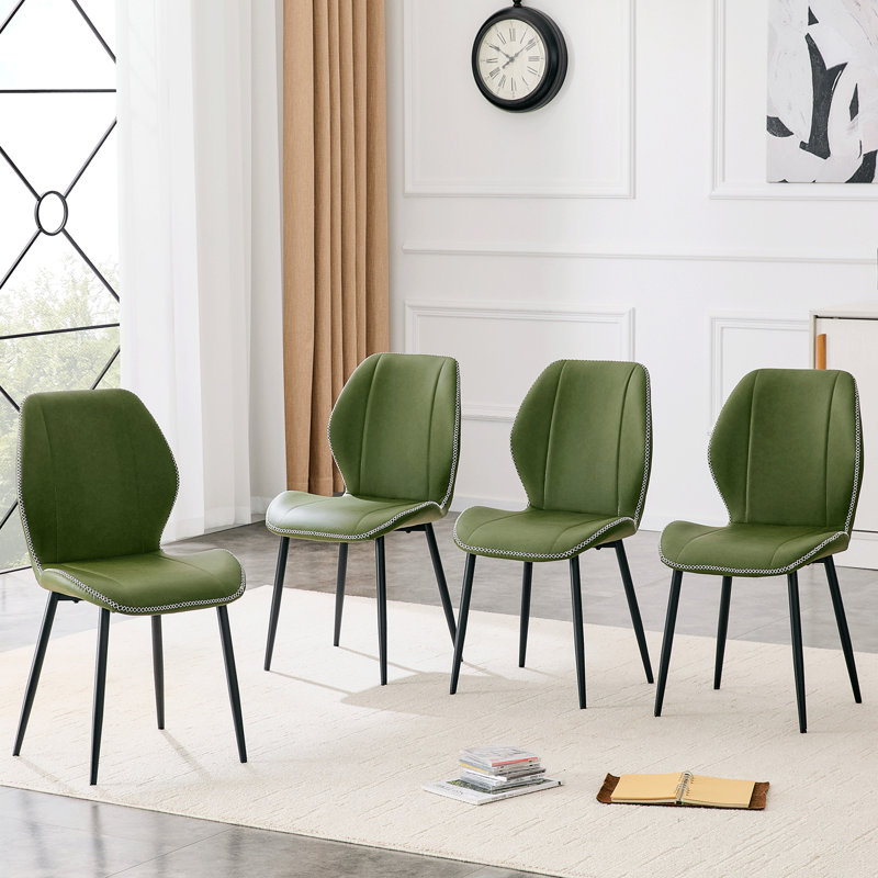4 ensembles de chaises de salle à manger en polyuréthane vert olive rétro avec un coussin spacieux et confortable. Plusieurs couleurs disponibles, avec des pieds en métal noir et des pieds réglables, convenant à la salle à manger, au bureau et au bureau, etc.