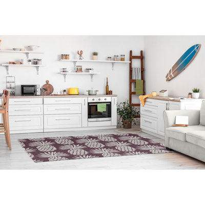 Tapis mauve / blanc à motif floral tissé à plat