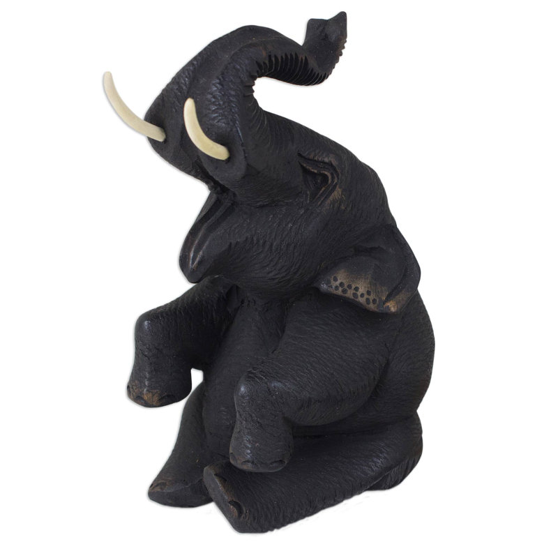 Sculpture teck éléphant bébé happy Kittery