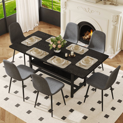 Ensemble de table et de chaises 71 x 35,4 pouces à grain de bois noir épissé avec fonction de rangement au milieu des pieds de la table.
