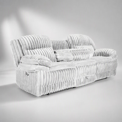 Fauteuil inclinable à mouvement manuel avec revêtement en velours côtelé gris pâle à effet fourrure, offrant confort et commodité pour la détente.