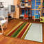 Tapis jaune / rouge / vert touffeté à motif abstrait Juliano-2022646959