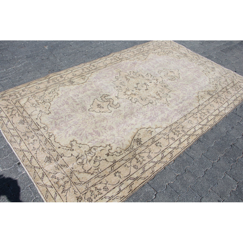 Grand tapis turc rétro beige discret - idéal pour décorer la salle à manger