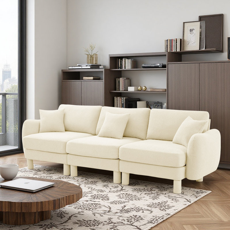 Canapé à 3 places en tissu Boucle avec accoudoirs distinctifs en forme de coquillage, pieds cylindriques enveloppés de tissu d'ameublement