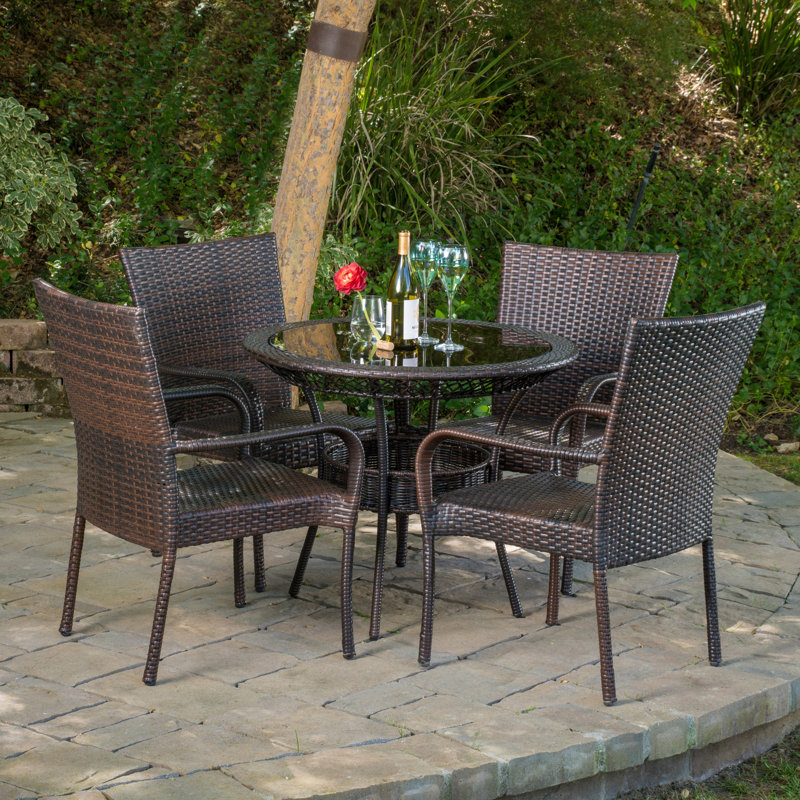 Donahoe 4 - Person Wicker Patio Dining Set with Round Table